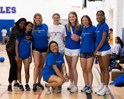 Instructors and volunteers standing together